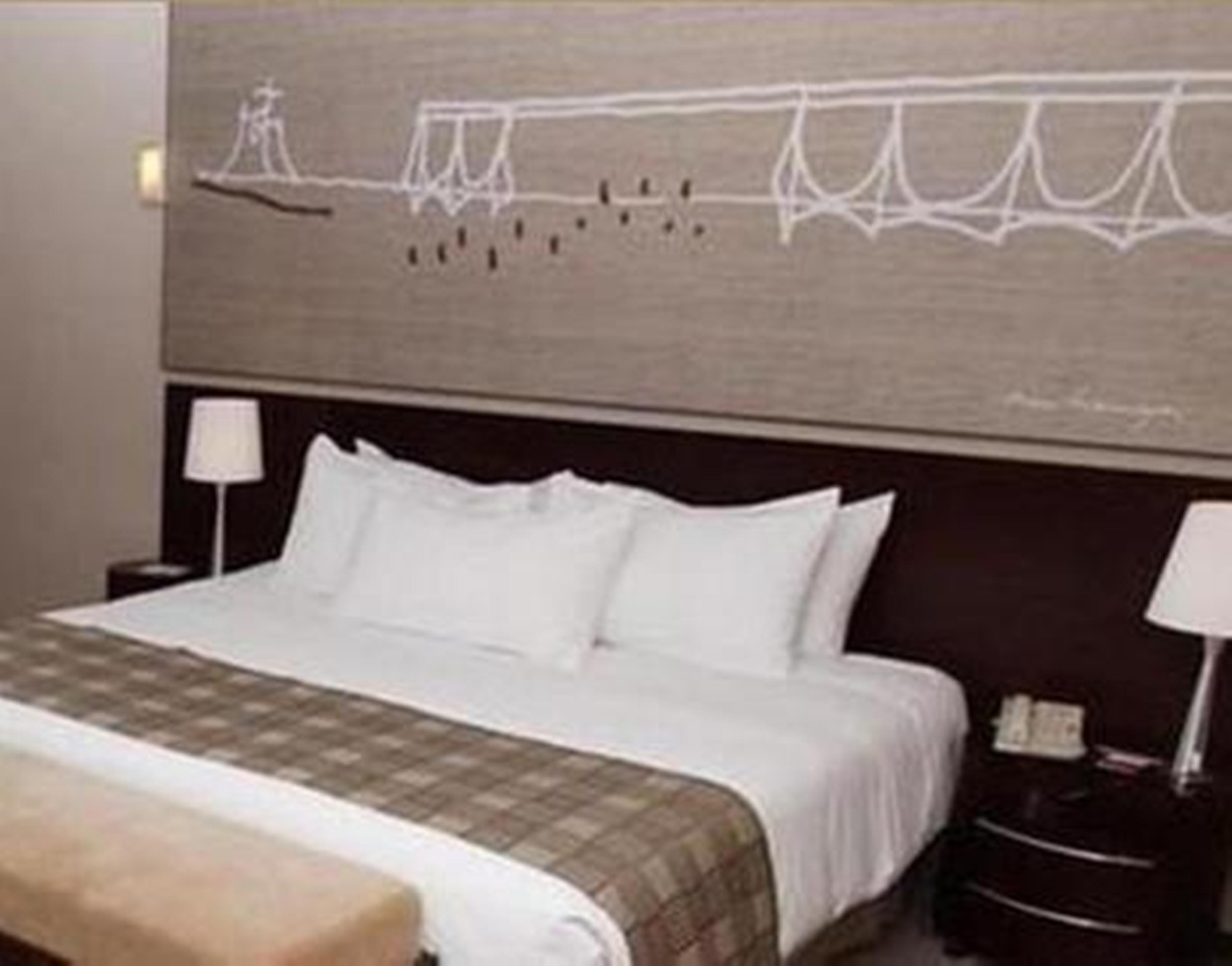 Отель Royal Tulip Brasilia Alvorada Экстерьер фото A bedroom at the hotel