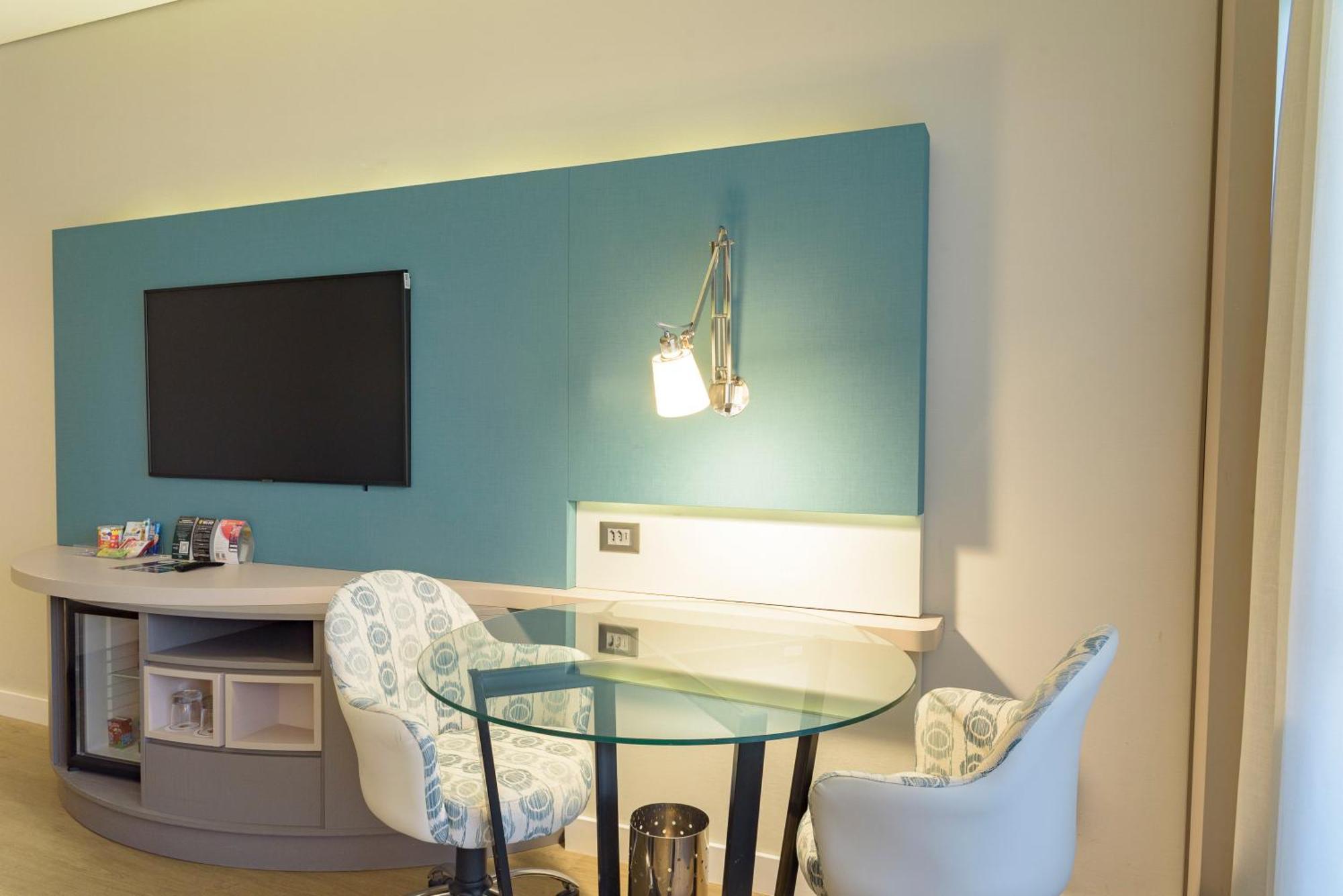Отель Royal Tulip Brasilia Alvorada Номер фото A wall-mounted light